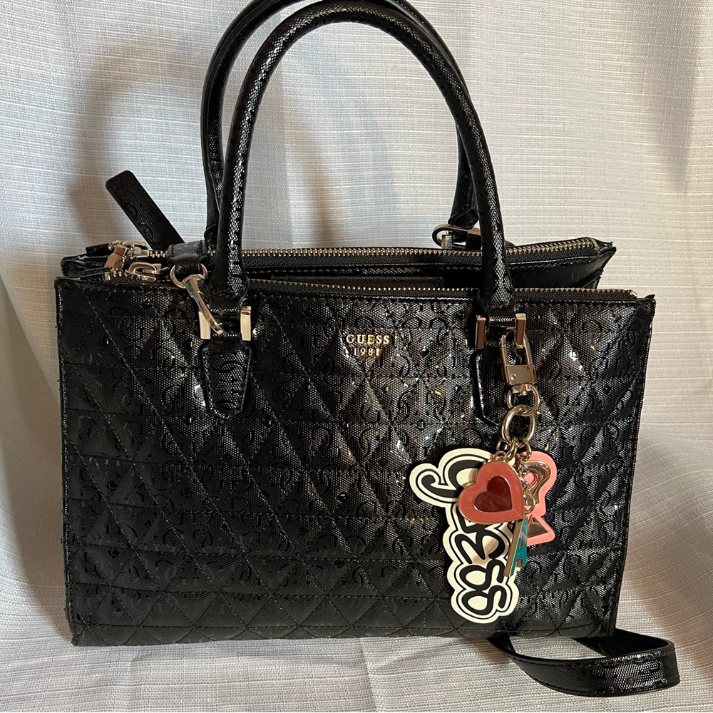 Black guess handbag medium lots of zippers